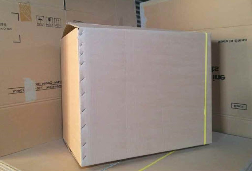 Carton with staple connection